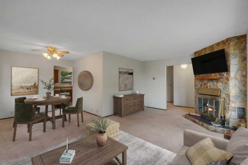 5811 11 Street Nw, Calgary, AB - Indoor Photo Showing Other Room With Fireplace