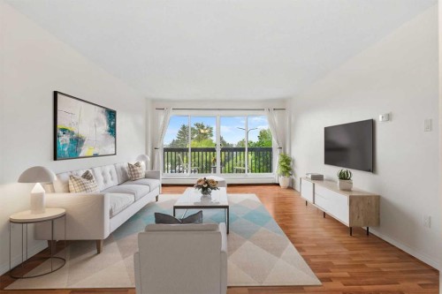 607-8948 Elbow Drive Sw, Calgary, AB - Indoor Photo Showing Living Room