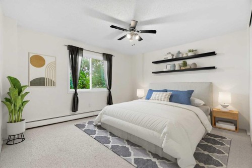 607-8948 Elbow Drive Sw, Calgary, AB - Indoor Photo Showing Bedroom