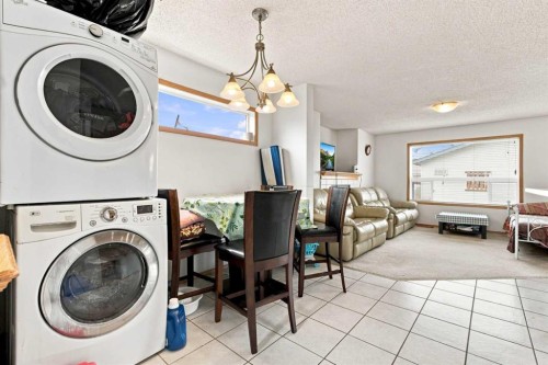 162 Taradale Drive Ne, Calgary, AB - Indoor Photo Showing Laundry Room