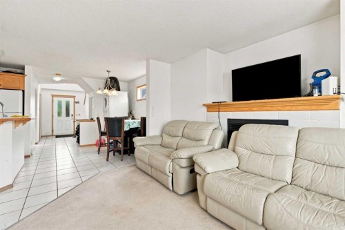 162 Taradale Drive Ne, Calgary, AB - Indoor Photo Showing Living Room
