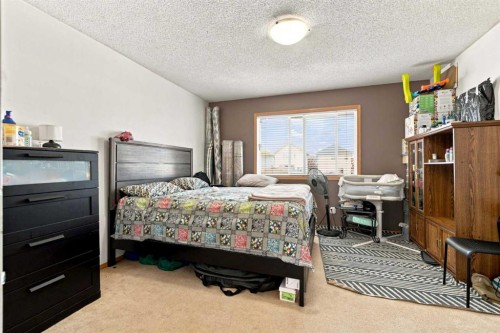 162 Taradale Drive Ne, Calgary, AB - Indoor Photo Showing Bedroom