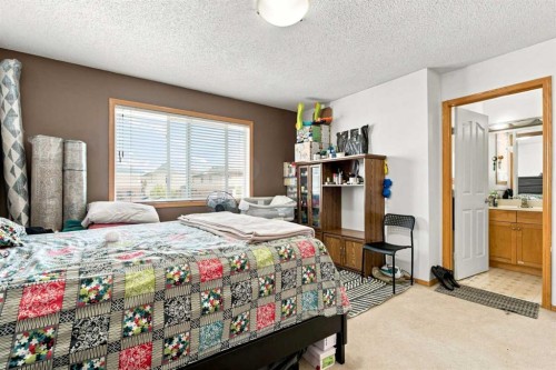 162 Taradale Drive Ne, Calgary, AB - Indoor Photo Showing Bedroom