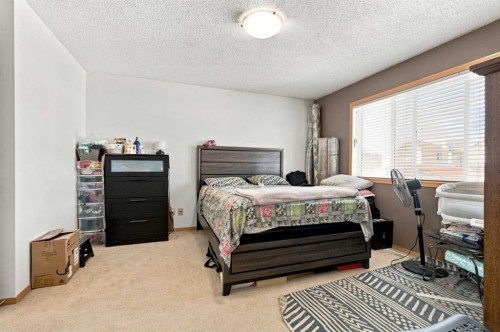 162 Taradale Drive Ne, Calgary, AB - Indoor Photo Showing Bedroom