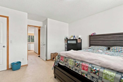162 Taradale Drive Ne, Calgary, AB - Indoor Photo Showing Bedroom