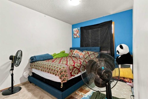 162 Taradale Drive Ne, Calgary, AB - Indoor Photo Showing Bedroom