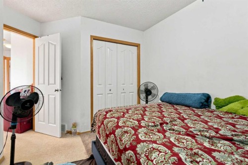 162 Taradale Drive Ne, Calgary, AB - Indoor Photo Showing Bedroom