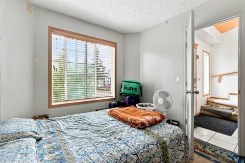 162 Taradale Drive Ne, Calgary, AB - Indoor Photo Showing Bedroom