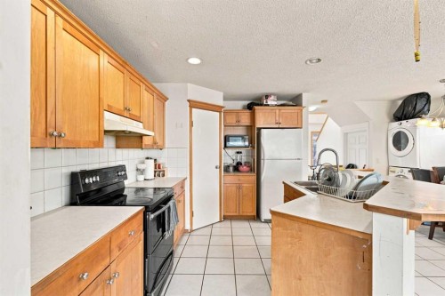 162 Taradale Drive Ne, Calgary, AB - Indoor Photo Showing Kitchen