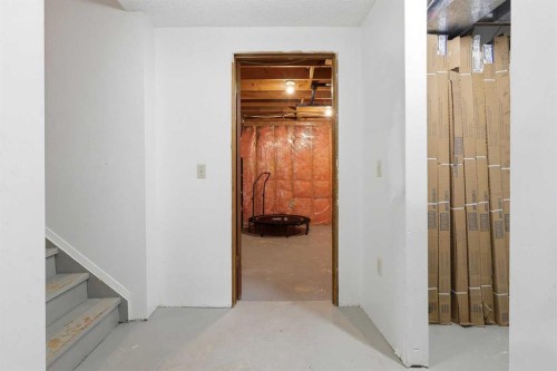 816 Ranchview Circle Nw, Calgary, AB - Indoor Photo Showing Other Room