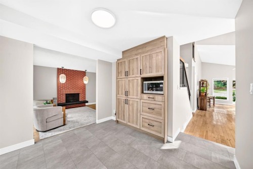 39 Woodfield Crescent Sw, Calgary, AB - Indoor With Fireplace