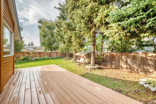 39 Woodfield Crescent Sw, Calgary, AB - Outdoor With Deck Patio Veranda