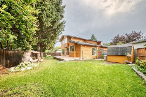 39 Woodfield Crescent Sw, Calgary, AB - Outdoor With Backyard