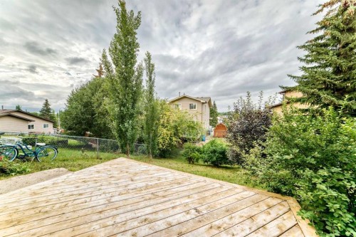 270 Glenpatrick Drive, Cochrane, AB - Outdoor With Deck Patio Veranda