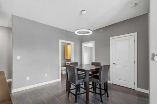 402-11 Millrise Drive Sw, Calgary, AB - Indoor Photo Showing Dining Room