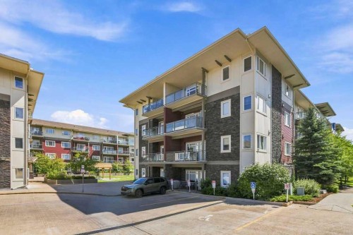 402-11 Millrise Drive Sw, Calgary, AB - Outdoor With Balcony With Facade