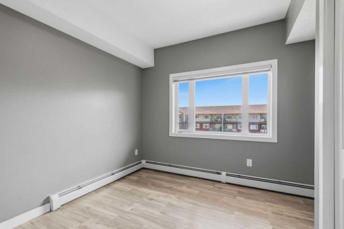 402-11 Millrise Drive Sw, Calgary, AB - Indoor Photo Showing Other Room