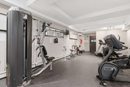 402-11 Millrise Drive Sw, Calgary, AB - Indoor Photo Showing Gym Room