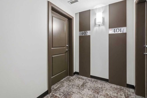 402-11 Millrise Drive Sw, Calgary, AB - Indoor Photo Showing Other Room
