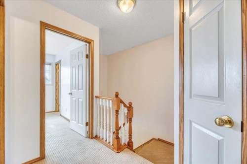 131 Hidden Way Nw, Calgary, AB - Indoor Photo Showing Other Room