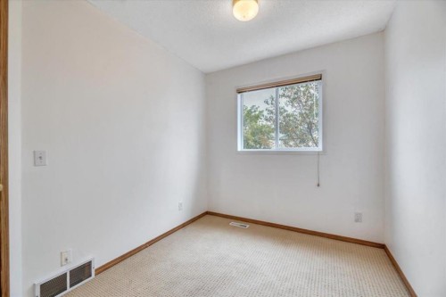 131 Hidden Way Nw, Calgary, AB - Indoor Photo Showing Other Room
