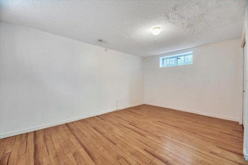 131 Hidden Way Nw, Calgary, AB - Indoor Photo Showing Other Room