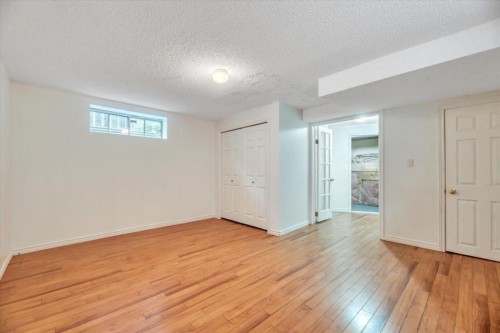 131 Hidden Way Nw, Calgary, AB - Indoor Photo Showing Other Room