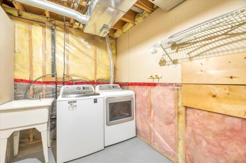 131 Hidden Way Nw, Calgary, AB - Indoor Photo Showing Laundry Room