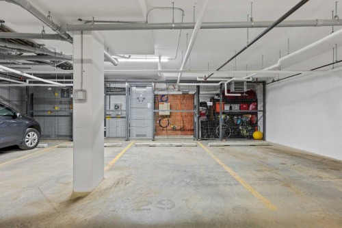 3301-100 Banister Drive, Okotoks, AB - Indoor Photo Showing Garage