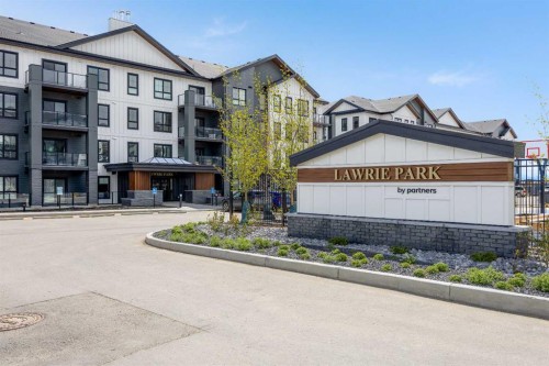 3301-100 Banister Drive, Okotoks, AB - Outdoor With Balcony With Facade