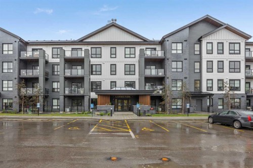 3301-100 Banister Drive, Okotoks, AB - Outdoor With Balcony With Facade