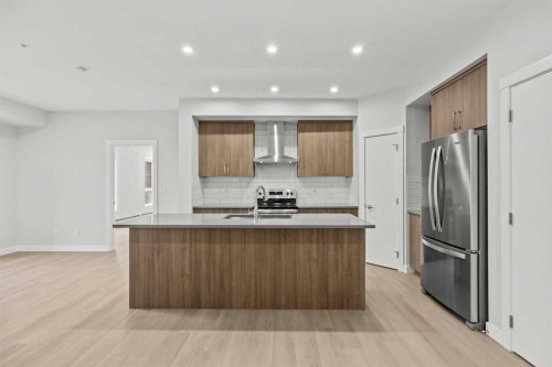 3301-100 Banister Drive, Okotoks, AB - Indoor Photo Showing Kitchen