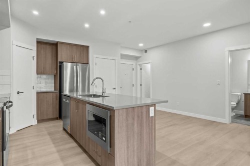 3301-100 Banister Drive, Okotoks, AB - Indoor Photo Showing Kitchen With Stainless Steel Kitchen With Upgraded Kitchen