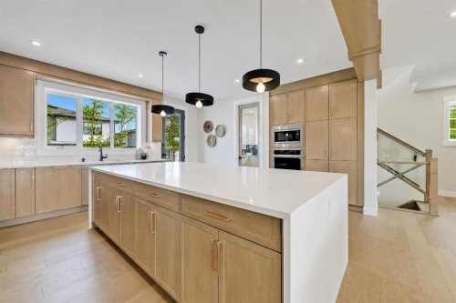 49 Rockhaven Green Nw, Calgary, AB - Indoor Photo Showing Kitchen With Upgraded Kitchen