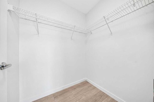 1211-220 Seton Grove Se, Calgary, AB - Indoor With Storage