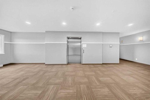 1211-220 Seton Grove Se, Calgary, AB - Indoor Photo Showing Other Room
