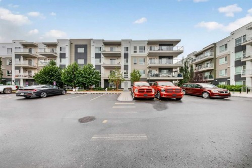 1211-220 Seton Grove Se, Calgary, AB - Outdoor With Balcony With Facade