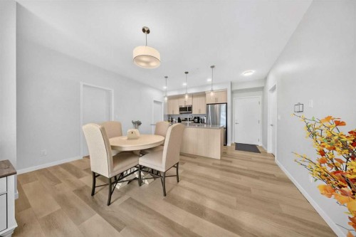 1211-220 Seton Grove Se, Calgary, AB - Indoor Photo Showing Dining Room