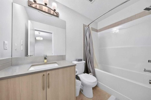 1211-220 Seton Grove Se, Calgary, AB - Indoor Photo Showing Bathroom