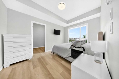 1211-220 Seton Grove Se, Calgary, AB - Indoor Photo Showing Bedroom