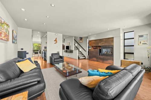 1937 28 Avenue Sw, Calgary, AB - Indoor Photo Showing Living Room With Fireplace