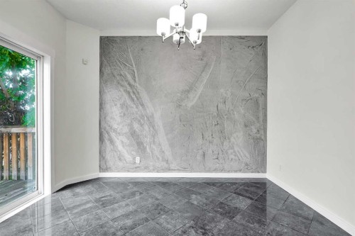 7097 Laguna Way Ne, Calgary, AB - Indoor Photo Showing Other Room