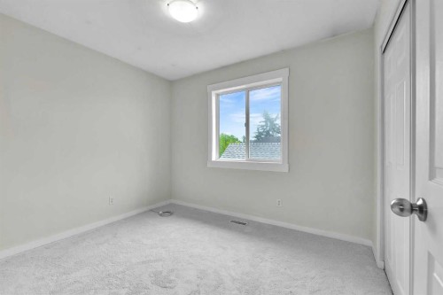 7097 Laguna Way Ne, Calgary, AB - Indoor Photo Showing Other Room