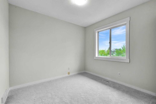 7097 Laguna Way Ne, Calgary, AB - Indoor Photo Showing Other Room