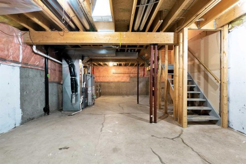 7097 Laguna Way Ne, Calgary, AB - Indoor Photo Showing Basement