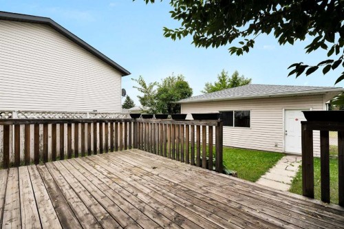 7097 Laguna Way Ne, Calgary, AB - Outdoor With Deck Patio Veranda With Exterior