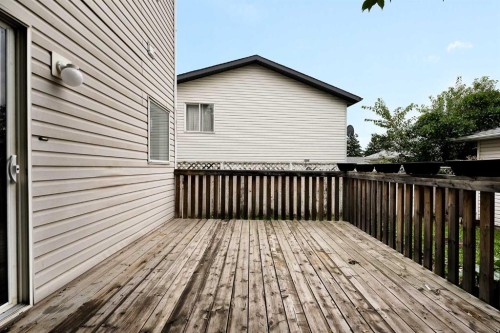 7097 Laguna Way Ne, Calgary, AB - Outdoor With Deck Patio Veranda With Exterior