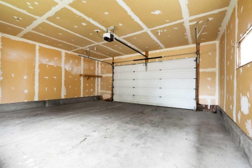 7097 Laguna Way Ne, Calgary, AB - Indoor Photo Showing Garage