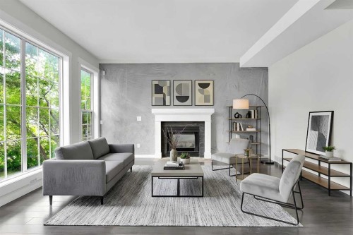 7097 Laguna Way Ne, Calgary, AB - Indoor Photo Showing Living Room With Fireplace