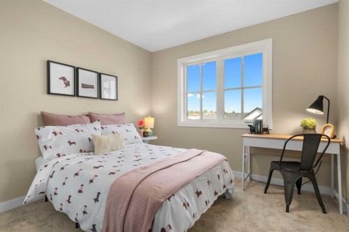 329 Flare Avenue Sw, Diamond Valley, AB - Indoor Photo Showing Bedroom